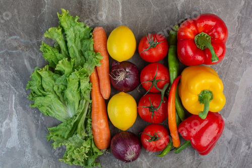 Preview: A lot of fresh vegetables on marble background