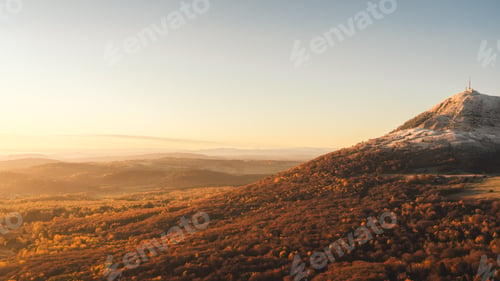 Preview: Sunrise from Puy de Pariou above the stairs going up to the summit, between autumn and winter.