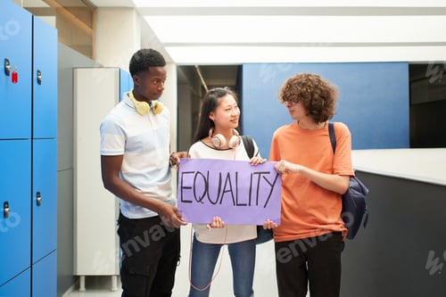 Preview: Group of students of different ethnicities carrying a banner at school protesting for equality.