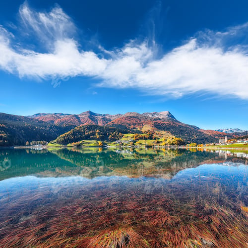 Preview: Picturesque autumn view of San Valentino village and Muta or Haidersee lake.