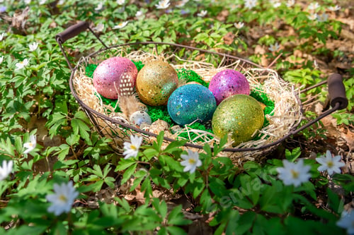 Preview: Easter background for spring holidays. Easter composition with colorful Easter eggs on moss