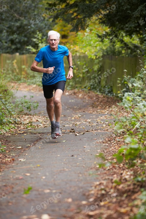 Preview: Mature Male Jogger Running Along Path