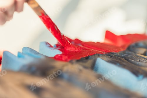 Preview: Paintbrush painting the surface of some polystyrene surface
