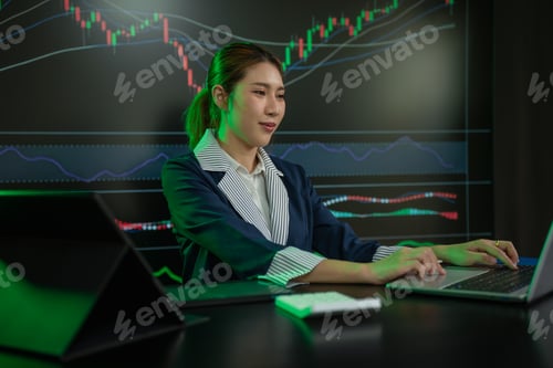 Preview: Businessman female trading stocks online.