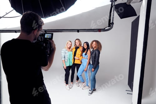 Preview: Group Studio Photo Shoot Of Young Multi-Cultural Female Friends Smiling And Laughing At Camera