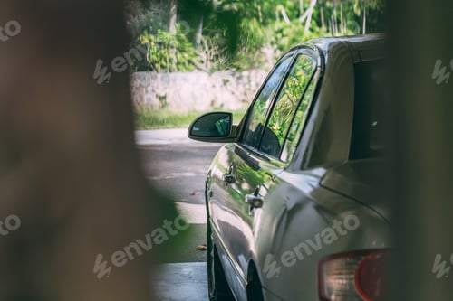 Preview: Shot of a gray car parked outdoors