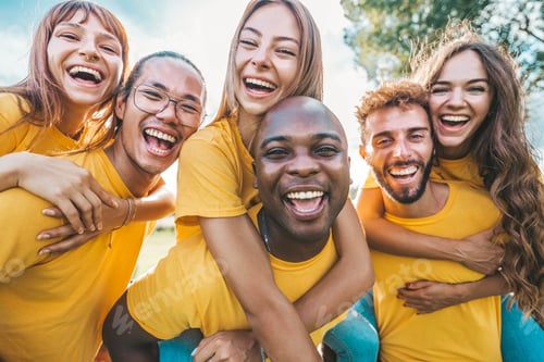 Preview: Multiracial community of young people smiling at camera outdoors
