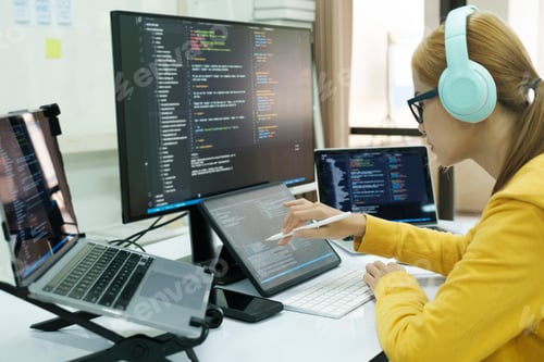 Preview: Programmer is coding and programming software.