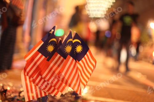 Preview: Selective focused shot of small Malaysian flags next to each other. Perfect for depicting Malaysia