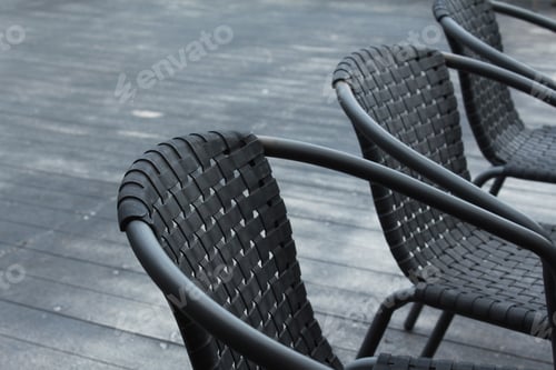 Preview: Black chairs in a outdoor cafe