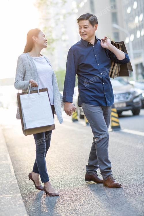 Preview: Happy mature couple shopping