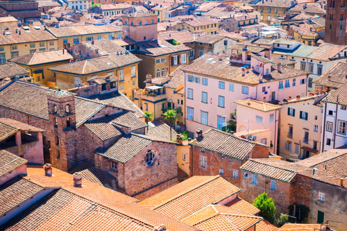 Preview: Beautiful view from the roof of ancient old buildings with red roofs in Lucca, Italy