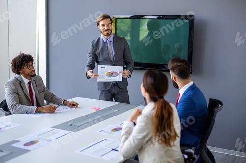 Preview: Corporate business team and manager in a meeting