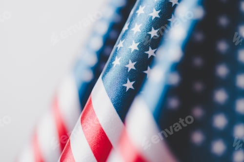 Preview: selective focus of usa national flags isolated on grey, memorial day concept