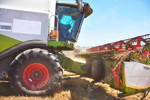 Preview: close view of modern combine harvester in action