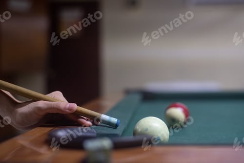 Preview: pool player hands on pool table