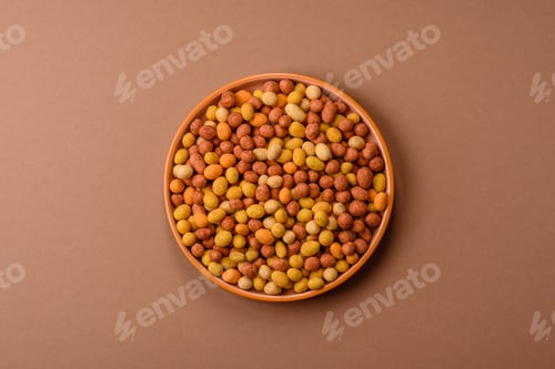 Preview: Food, nuts coated with salt and paprika, peanuts as a source of protein. Salted peanuts
