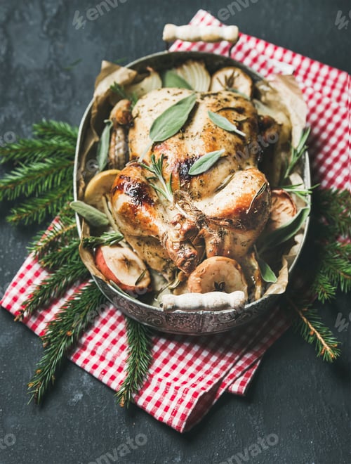Preview: Oven roasted whole chicken in tray with Christmas table decotarion