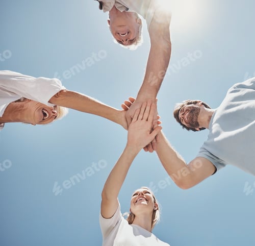 Preview: Low angle, friends and family with hands together, sunlight and support outdoor, bonding and team b