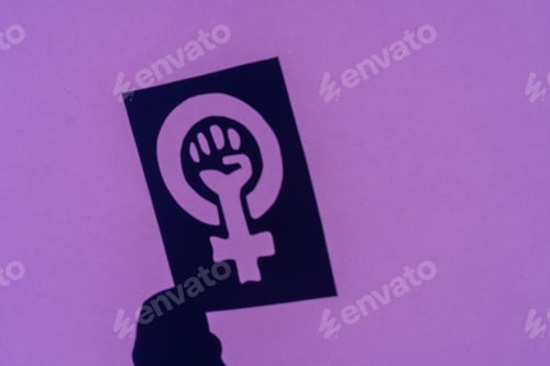 Preview: Symbol of the struggle of feminism on a purple background