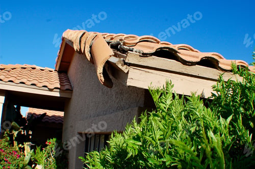 Preview: Tile Damage on the corner of roof of a home