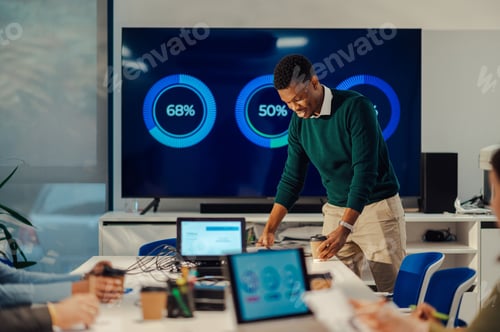 Preview: Portrait of an african american man boss holding a meeting in a modern office