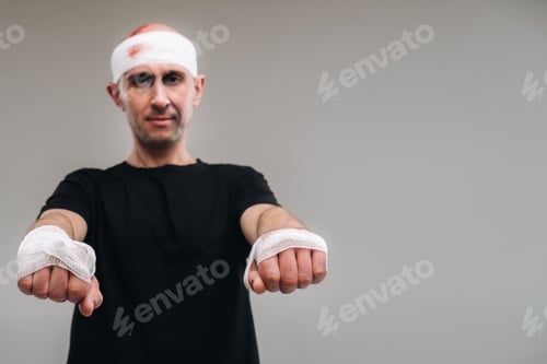 Preview: Man with Bandages Portrait on Grey Background