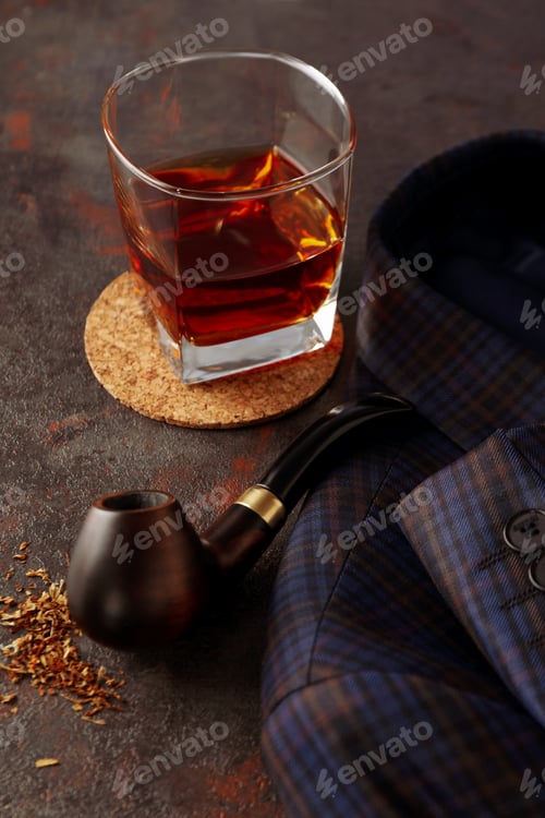 Preview: Concept of relaxation with smoking tobacco with smoking pipe and drinking alcohol