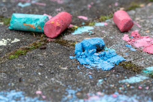 Preview: Crushed chalk pieces on pavement