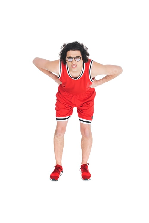 Preview: Skinny sportsman in eyeglasses squinting isolated on white