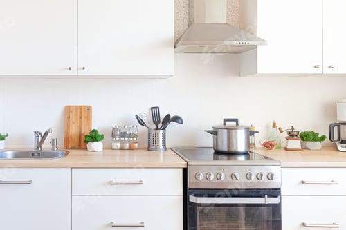 Preview: Modern kitchen interior design with light colors.