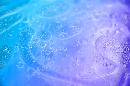 Preview: blue and purple abstract background formed by oil drops on water