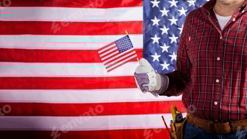 Preview: Carpenter in protective gloves and toolbelt with us flag labor day background