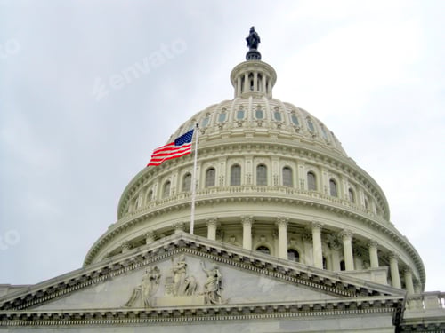 Preview: View of the Capitol Building Dome with the United States flag in Washington D.C during USA travel