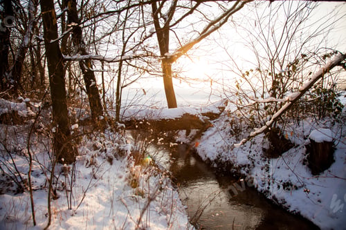 Preview: Sunset over countryside river in a snow, Poland, Lower Silesia