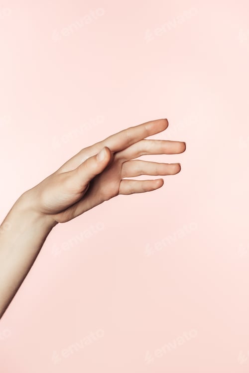 Preview: cropped image of woman gesturing by hand isolated on pink background
