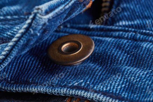 Preview: Denim Jeans Texture Background With Torn. The Texture Of The Colored Cotton Fabric. Stitched