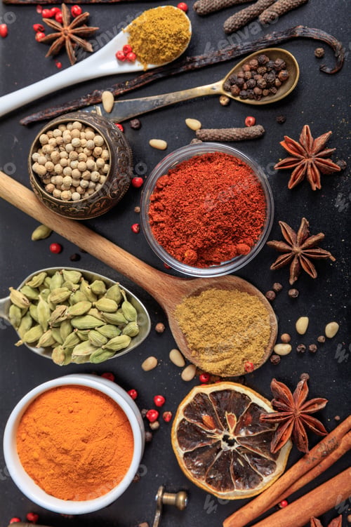 Preview: Spices and herbs flat lay, black color background, top view.