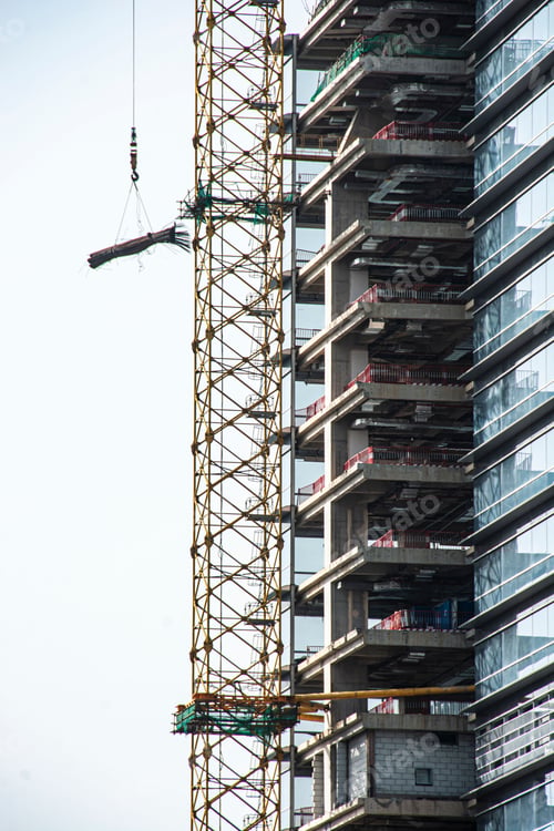 Preview: High-rise building construction with crane