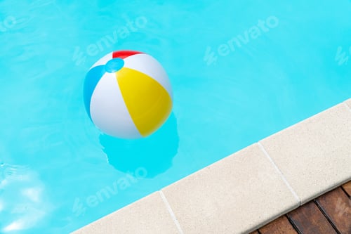Preview: Colorful inflatable Ball Floating on a swimming pool