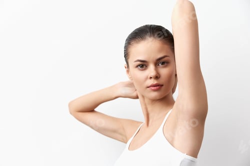 Preview: Model with smooth skin posing against a white backdrop, showcasing a natural look and elegant stance