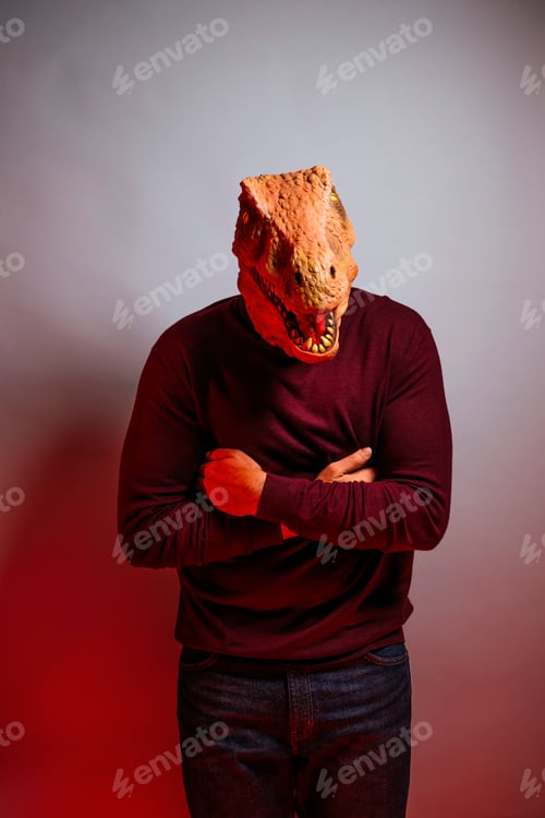 Preview: Man with lizard head in the studio.