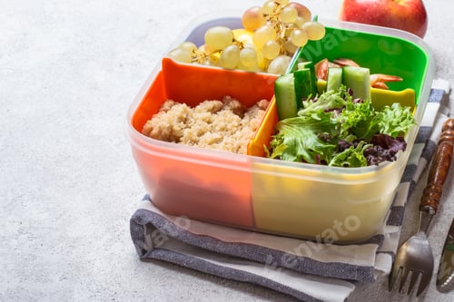 Preview: lunch box with a balanced meal. Healthy food concept in the office