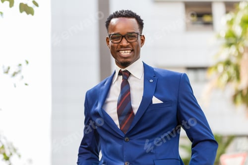 Preview: Outdoor standing portrait of a black African American business m