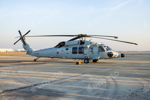 Preview: Military Utility Helicopter Parked on Airfield