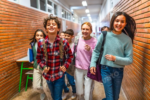 Preview: Group of elementary school students running in school hallway