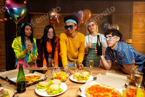 Preview: Group of friends making party at home on new year evening