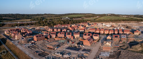 Preview: Aerial panoramia view directly above a new build housing estate in the UK