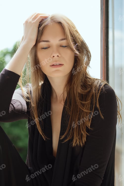 Preview: Sensual lifestyle portrait of beautiful woman model with no makeup and clean healthy skin