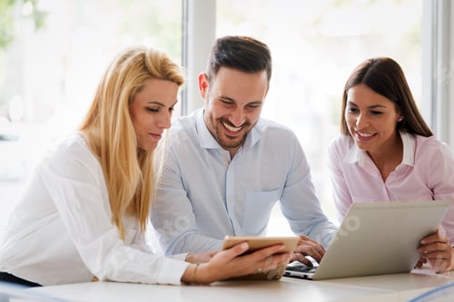 Preview: Business colleagues laughing